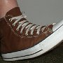 Brown High Top Chucks  Wearing chocolate high tops, rigth side view.