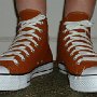 Brown High Top Chucks  Wearing Sienna brown high tops, front view.