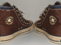 Brown and Navy Blue Double Upper High Top Chucks  Angled rear view of brown and navy blue double upper high tops.