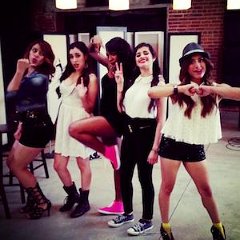 Camila Cabello  Camila wearing purple chucks with her former Fifth harmony groupmates