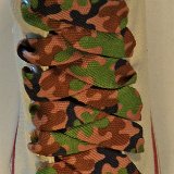 Camouflage Shoelaces on Chucks  Army Green Camouflage print shoelaces on a natural white high top.