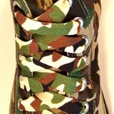 Camouflage Print Shoelaces On Chucks  Desert camouflage print shoelaces on green camouflage print high top chucks.