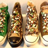 Camouflage Print Shoelaces On Chucks  Desert camouflage print shoelaces on green and camouflage print high top chucks.