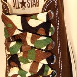 Camouflage Print Shoelaces On Chucks  Desert camouflage print shoelaces on chocolate brown low cut chucks.