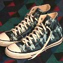 Camouflage Chucks  Blue camouflage high tops, angled side view.