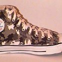 Camouflage Chucks  Left brown camouflage high top, inside view.