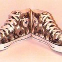 Camouflage Chucks  Brown camouflage high tops, angled front view.