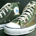 Camouflage Chucks  Green camouflage high tops, angled side view.