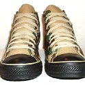 Camouflage Chucks  Front view of olive green camouflage high tops.