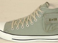Cargo High Top Chucks  Left olive green cargo high top with hemp laces, side pocket view.