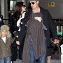 Celebrities Wearing Black Chucks  Angelina Jolie and her kids.