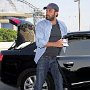 Celebrities Wearing Black Chucks  Ben Affleck opening a car door.