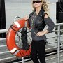 Celebrities Wearing Black Chucks  Carmen Electra wearing black oxfords on a boat.