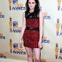 Celebrities Wearing Black Chucks  Kristen Stewart wearing black high tops at the MTV Movie awards, shot 3.