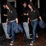 Celebrities Wearing Black Chucks  Double shot of Actress Kristen Stewart.