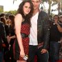 Celebrities Wearing Black Chucks  Actress Kristen Stewart wearing black high top chucks at the MTV Movie awards, shot 6.