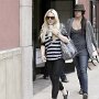 Celebrities Wearing Black Chucks  Lindsay Lohan wearing blue slip-on chucks, shot 5.