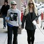 Celebrities Wearing Black Chucks  Lindsay Lohan wearing blue slip-on chucks, shot 6.