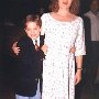 Celebrities Wearing Red Chucks  A young Elijah Wood with his mother.