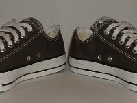 Core Charcoal Grey Low Cut Chucks  Angled front view of charcoal grey low cut chucks.