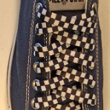 Checkered Laces on Chucks  Navy blue low top chuck with 45x3/8 inch black and white checkered shoelaces.
