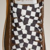 Black and White Checkered Shoelaces on Chucks  Chocolate brown low top chuck with black and white checkered shoelaces.