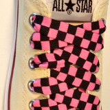 Black and Pink Checkered Shoelaces on Chucks  Unbleached white low top chuck with black and pink checkered shoelaces.