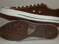 Core Chocolate Brown Low Cut Chucks  Inside and sole views of chocolate brown low cut chucks.