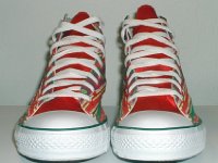 Christmas High Top Chucks  Front view of holiday pattern and red satin 2-tone high tops.