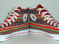 Christmas High Top Chucks  Angled front views of holiday pattern and red satin 2-tone high tops.