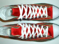Christmas High Top Chucks  Top view of holiday pattern and red satin 2-tone high tops.