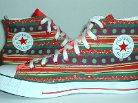 Christmas High Top Chucks  Inside patch viewa of holiday pattern and red satin 2-tone high tops.