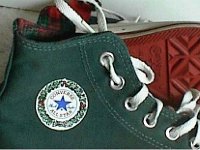 Christmas High Top Chucks  Close up of the patch and sole of green and red 2 tone high tops.