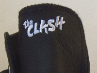 The Clash Black Leather High Top Chucks  Closeup of the Clash black leather high top tongue.