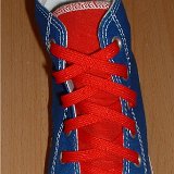 Red Classic Shoelaces  Royal blue and red 2-tone high top with red laces.