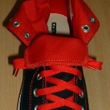 Red Classic Shoelaces  Black and red foldover high top with red laces.