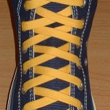 Gold Classic Shoelaces  Navy blue high top with gold laces.