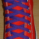 Purple Classic Shoelaces  Red high top with purple laces.