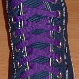 Purple Classic Shoelaces  Navy blue high top with purple laces.