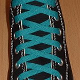 Classic Teal Shoelaces  Black high top with teal laces.