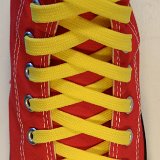 Classic Yellow Shoelaces  Red high top with classic yellow laces.