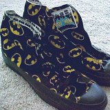 Collectors Items  Batman high tops, angled side view.