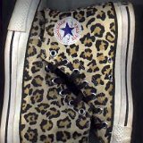 Collectors Items  Leopard print high tops, side views.