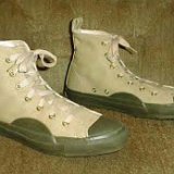 Collectors Items  L.L. Bean high tops in khaki and olive green, angled side views.