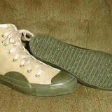 Collectors Items  L.L. Bean high top chucks in khaki and olive green, angled side and sole views.
