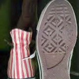 Collectors Items  Candy striped red and white high tops, outer sole and rear views.
