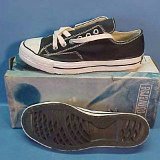 Collectors Items  Vintage black "Coach" model low cut with box, side and outer sole views.