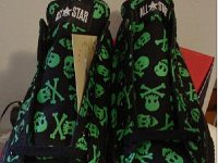 Chucks With Commercial Pattern Uppers  Top view of green and black Jackass logo high tops.