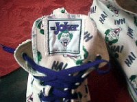 Chucks With Commercial Pattern Uppers  Close up of Joker high tops, showing the Joker patch on the tongue.