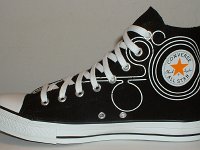 Converse Century Print High Top Chucks  Inside patch view of a right black, white, and orange century print high top.